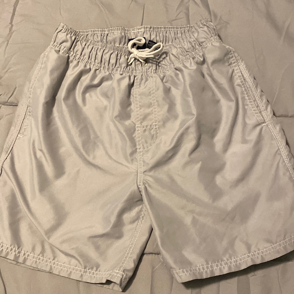 Retro swim trunks. Above knee fit